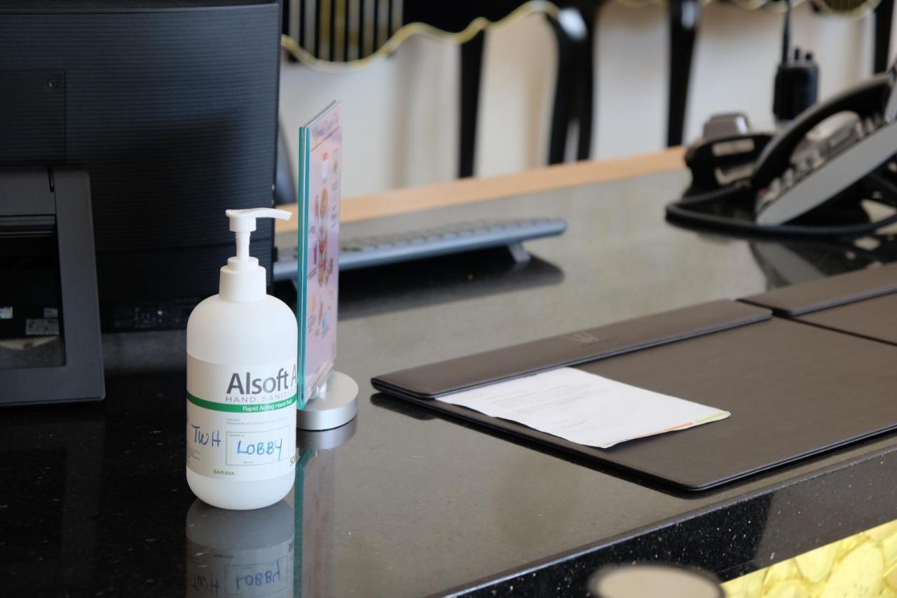 The Waterfront Hotel Kuching Eksteriør bilde A bottle of hand sanitizer